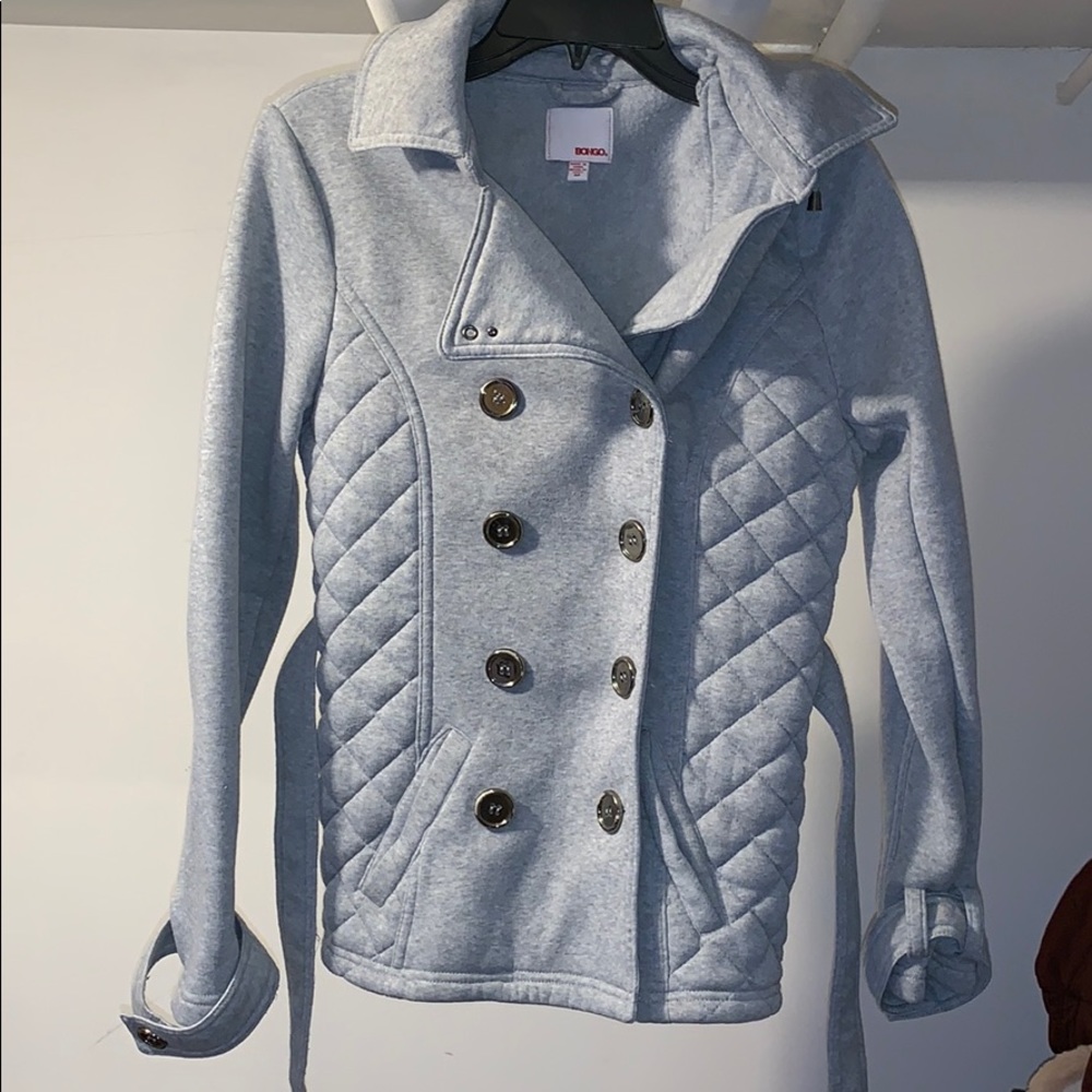 Woman’s gray coat